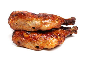 grilled chicken leg  on white background 