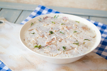 homemade aspic jelly with game meat and herbs, russian traditional cuisine