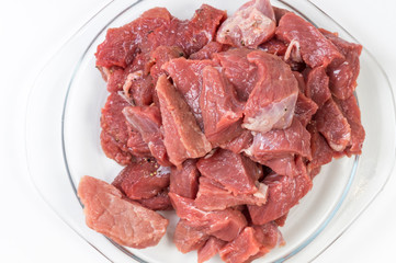 fresh beef meat in a plate top view