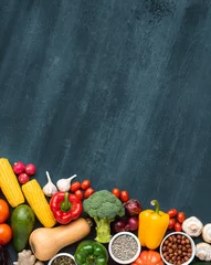 Crédence de cuisine en verre imprimé Manger Dieting and healthy eating concept: fruits, vegetables, vegan food ingredients over natural background.