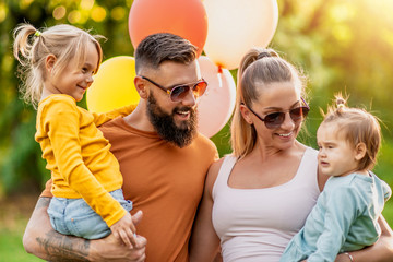 Cheerful family on vacation enjoying outdoors