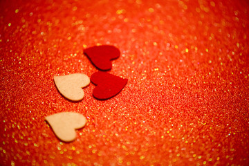Hearts over red abstract background with bokeh defocused lights