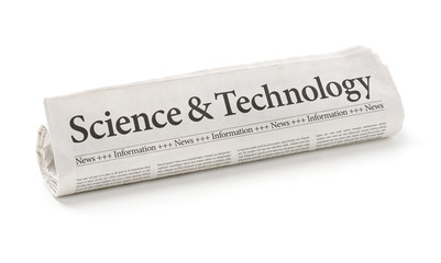 Rolled newspaper with the headline Science and Technology - obrazy, fototapety, plakaty