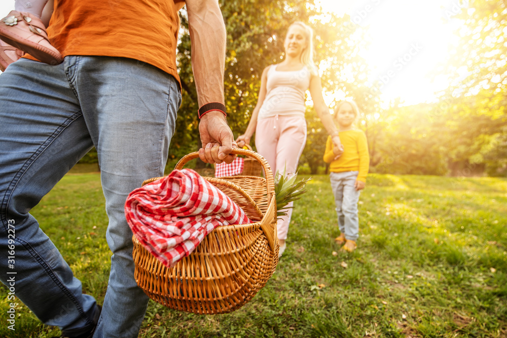 Wall mural cheerful family on vacation enjoying outdoors