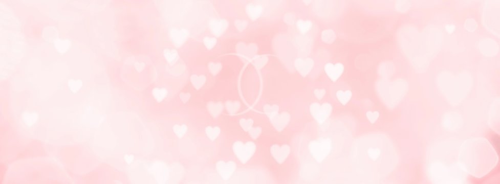 Abstract pink background with hearts and wedding rings - concept wedding, marriage, love