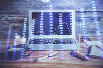 Multi exposure of chart and financial info and work space with computer background. Concept of international online trading.