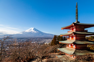 Landscape view of Mountain Fuji with snow cap and red Chureito pagoda in winter season, Yamanashi, Japan