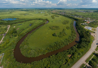 Aerial view of river in Irbit city. Russia, Sverdlovsk region, summer, sunny day