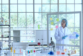 science medical study phamasutical medicine lab in hospital. scientist doing some research vaccine anti virus sample.technology medical of chemist  scientist working with microscope ware glass safty.