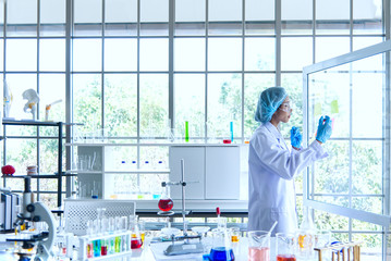 science medical study phamasutical medicine lab in hospital. scientist doing some research vaccine anti virus sample.technology medical of chemist  scientist working with microscope ware glass safty.