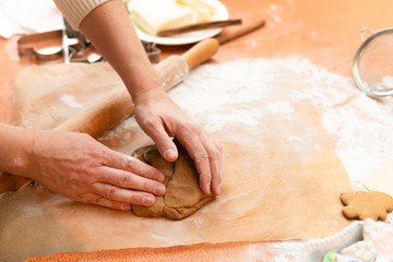 Obraz na płótnie Canvas Women prepare cookies in the kitchen concept cooking