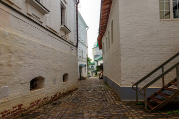 Old narrow street in Trinity Lavra of St. Sergius in Sergiev Posad, Russia