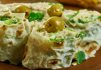 Cod liver pita bread cheese sandwich