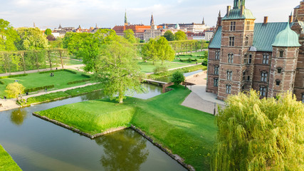 Obraz premium Aerial drone view of Rosenborg Slot Castle and beautiful garden from above, Kongens Have park in Copenhagen, Denmark