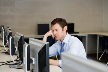 Fototapeta premium High School Teacher in Computer Lab