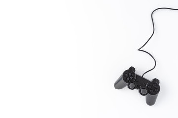 Overhead shot of video game console isolated on white background with copyspace. Computer player...