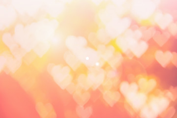 Blurred background of Valentine's day concept. Pink Valentines Day Card. Pastel color tone soft have gradient pattern. Multicolor white pink, orange and red hearts blur wallpaper in love bright sexy..