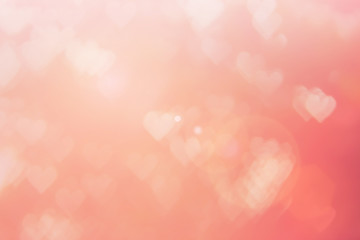 Blurred background of Valentine's day concept. Pink Valentines Day Card. Pastel color tone soft have gradient pattern. Multicolor white pink, orange and red hearts blur wallpaper in love bright sexy..