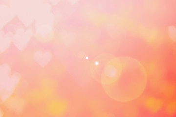 Blurred background of Valentine's day concept. Pink Valentines Day Card. Pastel color tone soft have gradient pattern. Multicolor white pink, orange and red hearts blur wallpaper in love bright sexy..