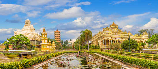 Fototapeta na wymiar Landscape with Vinh Tranh Pagoda in My Tho, the Mekong Delta, Vietnam