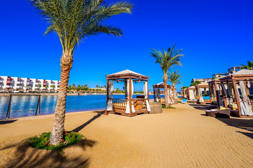 Obraz na płótnie Canvas Relaxing at beach at white beach - travel destination for vacation - Hurghada, Red Sea, Egypt