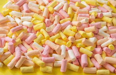 Multicolored marshmallows as a holiday background