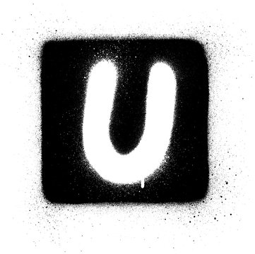 graffiti U font sprayed in white over black square