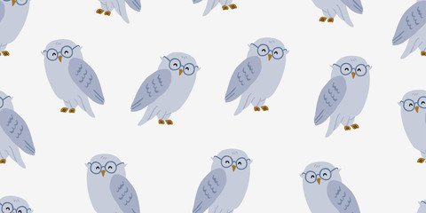 Seamless pattern with cute owl in eyeglasses