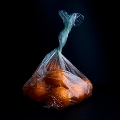 environmental concept. Polyethylene packaging hazard to the environment. Cellophane grocery bag.