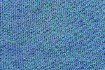 Texture of blue rough fabric, closeup material background