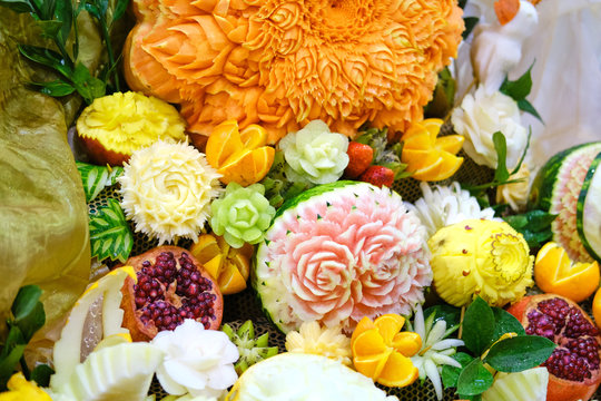 Carving on vegetables and fruits decorated with flowers
