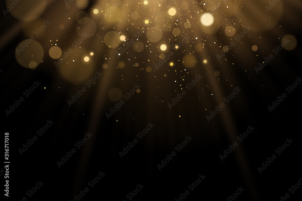 Poster golden flash of light with glares bokeh on a black background. rays of light with glitter. vector il