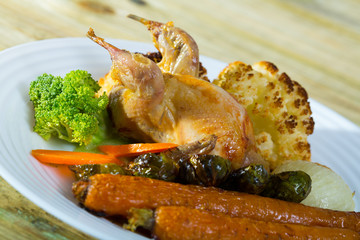Grilled wildfowl with roasted vegetables