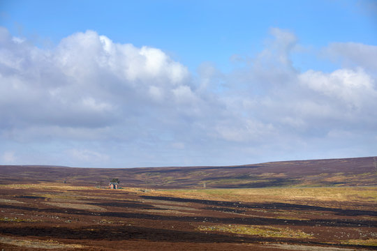 A very remote, isolated house on the moors with open moorland for miles around, Muggleswick Common, England, UK.