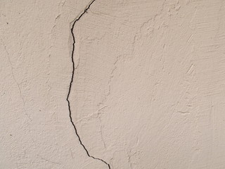 Obraz premium Pink wall with a crack.