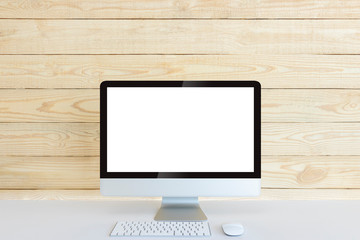 Fototapeta premium Computer with blank white copy space for text and wood background, Mockup design desktop computer in office on white table with keyboard and Coffee cub, Work place concept, Cactus in pot.