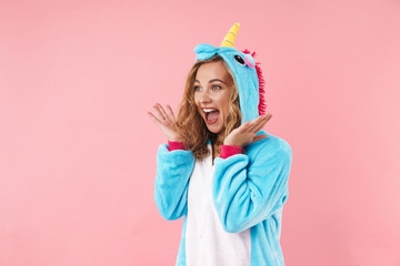 Image of caucasian excited woman screaming while expressing surprise © Drobot Dean