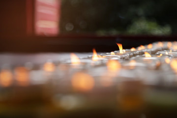 Candle glass to make merit with light the candle at Wat Boromracha Kanchanapisek Anusorn (or Wat...
