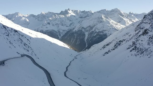 Aerial shot capturing the mountains of Soelden and overlooking the Timmelsjoch Pass leading up to the top.