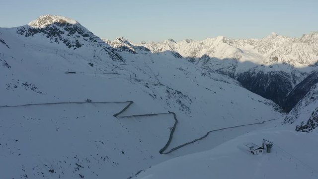 Aerial shot capturing the streets leading to the peak of mountains in Soelden called Timmelsjoch Pass.