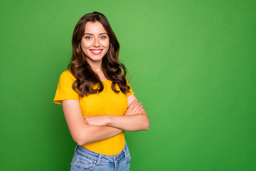 Portrait of her she nice-looking attractive lovely winsome cheerful cheery content wavy-haired girl folded arms isolated over bright vivid shine vibrant green color background - Powered by Adobe