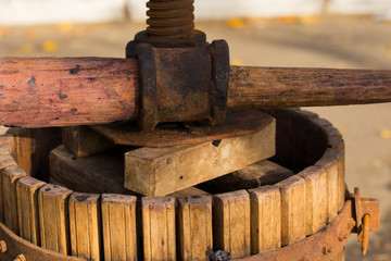 The squeezer is used to press the wine. Technology of wine production in Moldova. The folk tradition of making wine. The ancient tradition of grape processing. Harvest home.