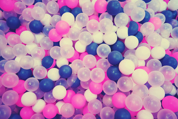 Background of colored plastic balls - red, white and blue color