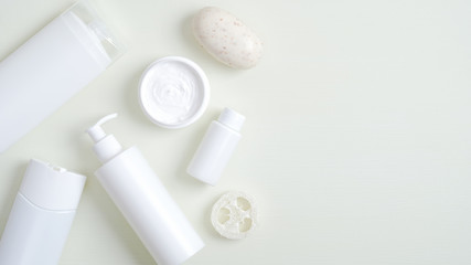 Cosmetics SPA branding mockup. Top view beauty product packaging, shampoo bottle, shower gel container, body cream jar, natural organic soap, essential oil for hair, bath luffa sponge