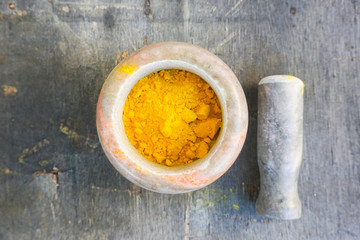 turmeric powder in  mortar