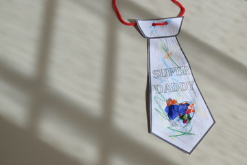 handmade necktie paper craft super dad gift from son made from recycle waste, happy father day concept