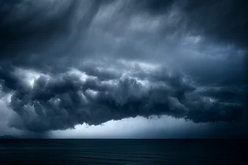 Fototapeten dunkle und dramatische stürmische Wolken über dem Meer © mimadeo