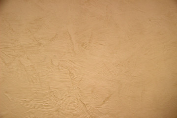 Texture of textured plaster on the wall