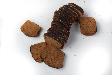 Fresh brown bread slice isolated on white background