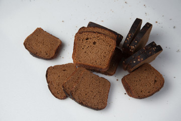 Fresh brown bread slice isolated on white background